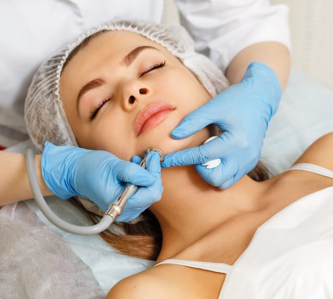 Advanced Peptide Infusion Facial for Skin Rejuvenation and Collagen Support – Peptide Treatment Licensed Provider Performing Precision Peptide Delivery to the Chin and Jawline During Facial Therapy – Peptide Treatment